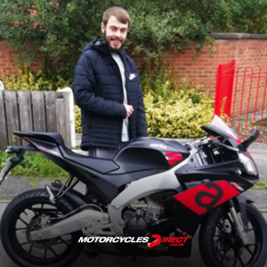 Ryan receiving his Aprilia RS125 all the way in North Yorkshire